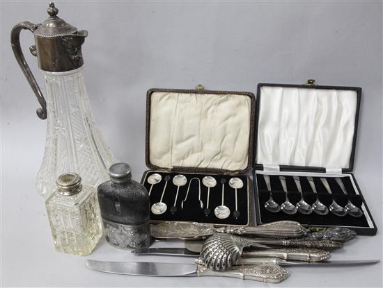 A collection of mixed silver and plated items including three cased sets of silver spoons.